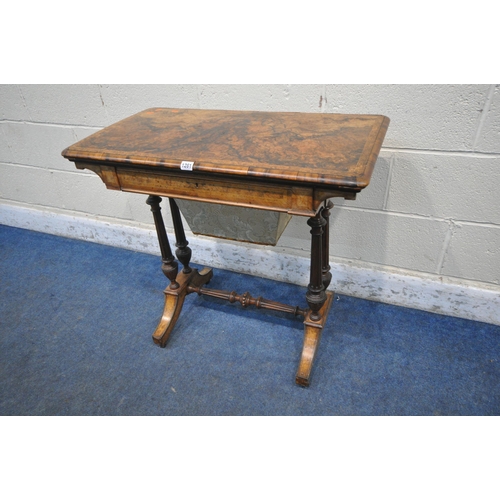 1261 - A 19TH CENTURY BURR WALNUT WORK TABLE, the revolving fold over top, enclosing a green baize, above a... 