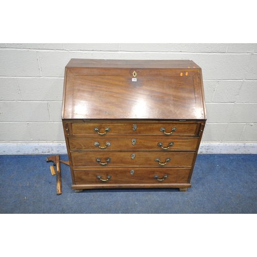 1265 - A GEORGIAN MAHOGANY BUREAU, the fall front door, enclosing a fitted interior, above four drawers, on... 