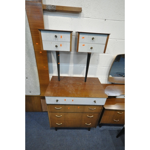 1268 - A MID CENTURY TEAK BEDROOM SUITE, comprising a double door wardrobe, with a central mirror, width 12... 