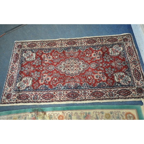 1273 - A GREEN GROUND CHINESE WOOLEN RUG,, with multi-strap border, 194cm x 123cm, an oval rug, along with ... 