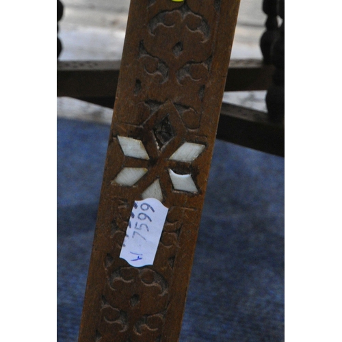 1274 - AN ISLAMIC ENGRAVED BRASS TRAY TABLE, on a folding wooden base, with mother of pearl inlay, diameter... 