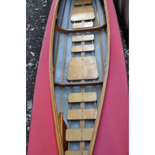 1003 - A VINTAGE 15ft WOODEN FRAMED KAYAK with vinyl covering and four double paddles