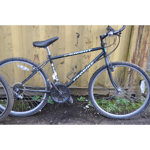 1004 - A PRO BIKE BLACK KNIGHT GENTS MOUNTAIN BIKE with 15speed Shimano gears, 17in frame along with a X Ra... 