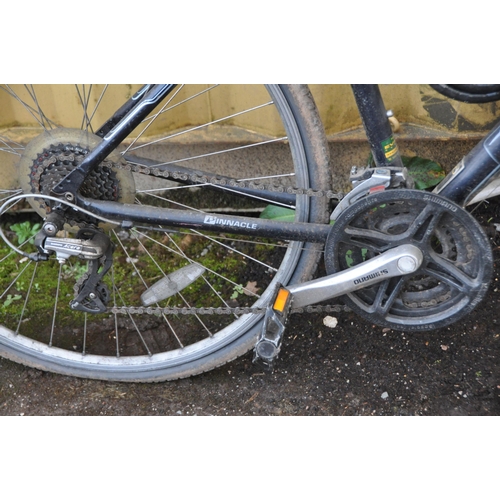 1005 - A PINNACLE STRATUS 2 GENTS MOUNTAIN BIKE with 24 speed Shimano gears, 19in frame, front light, helme... 