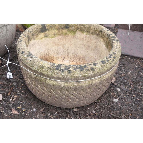 1016 - TWO LARGE MODERN COMPOSITE GARDEN PLANTERS one in the shape of a half barrel height 43cm the other w... 