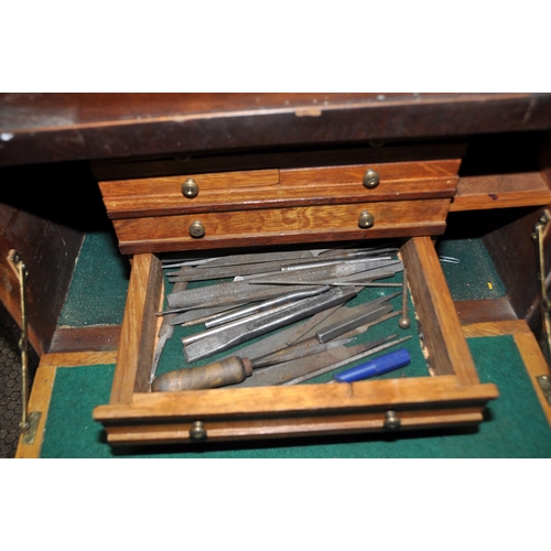 1051 - AN ART DECO MAHOGANY VENEERED OVER OAK CARCASS ENGINEERS TOOL CABINET with one external long drawer ... 