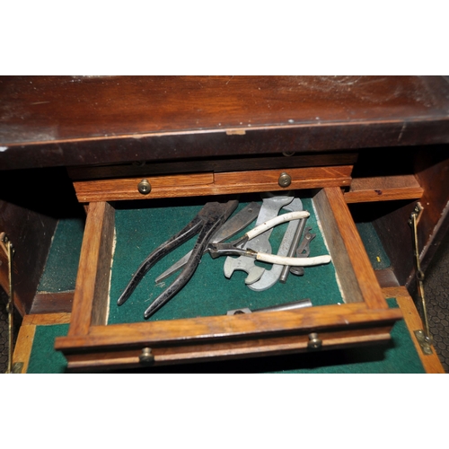 1051 - AN ART DECO MAHOGANY VENEERED OVER OAK CARCASS ENGINEERS TOOL CABINET with one external long drawer ... 