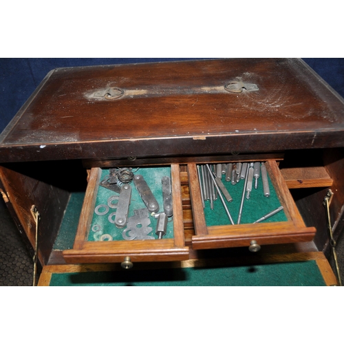 1051 - AN ART DECO MAHOGANY VENEERED OVER OAK CARCASS ENGINEERS TOOL CABINET with one external long drawer ... 