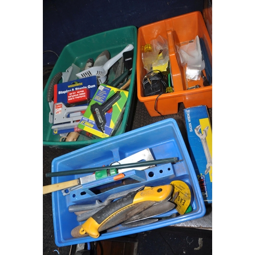 1055 - A PLASTIC BOX AND TWO TRAYS CONTAINING TOOLS including two vintage saws, two spirit levels, two bow ... 