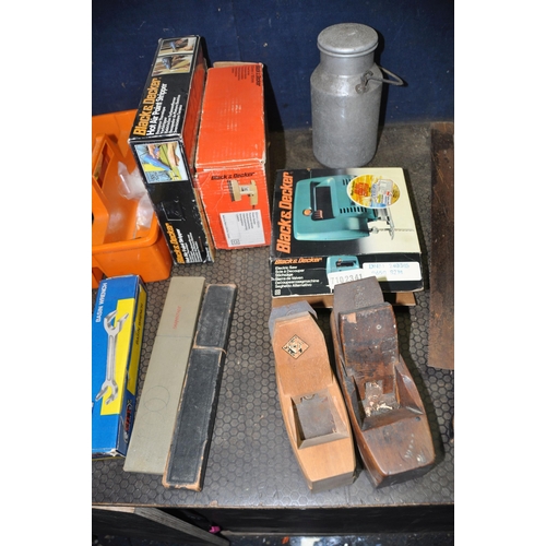 1055 - A PLASTIC BOX AND TWO TRAYS CONTAINING TOOLS including two vintage saws, two spirit levels, two bow ... 