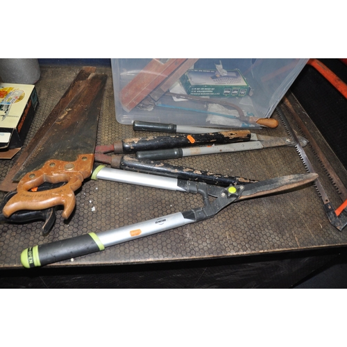 1055 - A PLASTIC BOX AND TWO TRAYS CONTAINING TOOLS including two vintage saws, two spirit levels, two bow ... 