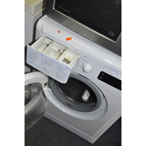 1059 - AN INDESIT IWE81681 WASHING MACHINE (spin cycle run but not tested any further BEARINGS NOISY AT HIG... 