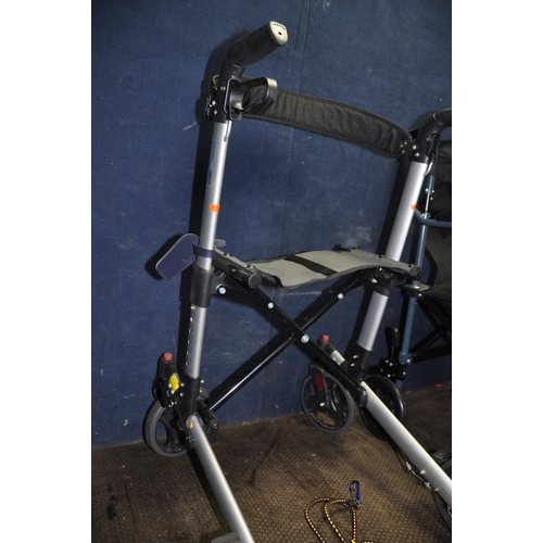 1068 - A DRIVE MEDICAL TRAVELITE LIGHTWEIGHT FOLDING WHEELCHAIR with two footrests and a Drive Medical fold... 