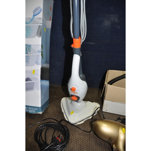 1074 - A VAX STEAM MOP, a Cooper handheld vac, a Princess handheld vacuum (all three PAT pass and working) ... 