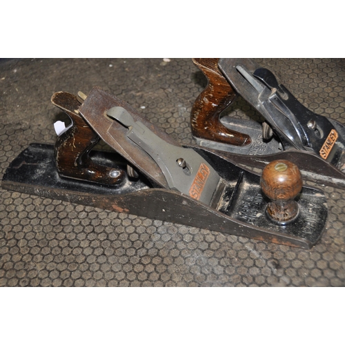 1081 - THREE STANLEY WOOD PLANES comprising of a No5 1/2 smoothing plane, a No4 and a No151 spokeshave (3) ... 