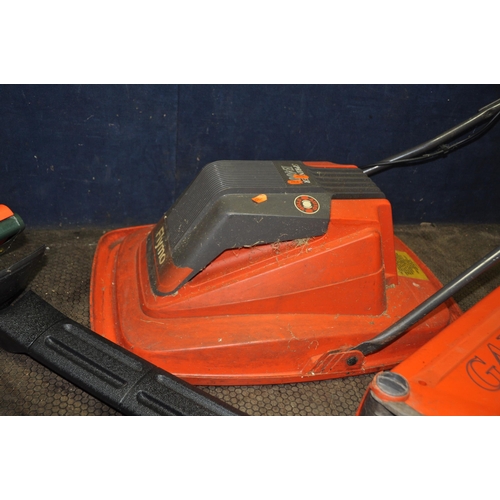 1094 - A FLYMO SPRINTER E400 LAWN MOWER, a Flymo Garden vac and a Black and Decker GT360 electric hedge tri... 