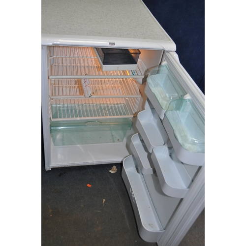 1099 - AN HOTPOINT UNDER COUNTER FRIDGE width 54cm depth 60cm height 85cm (PAT pass and working)