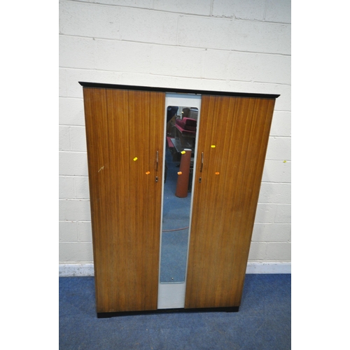 1268 - A MID CENTURY TEAK BEDROOM SUITE, comprising a double door wardrobe, with a central mirror, width 12... 