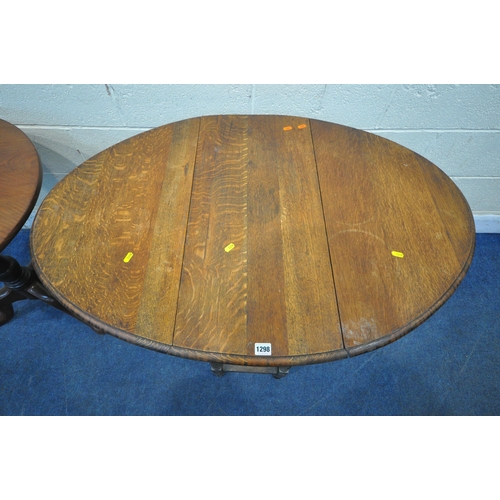 1298 - A GEORGIAN MAHOGANY CIRCULAR TILT TOP TRIPOD TABLE, diameter 69cm x height 73cm, along with a 20th c... 