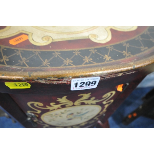 1299 - A BURGUNDY ORIENTAL STYLE OVAL TELEPHONE TABLE, with scrolled detail and bird decoration, on four ca... 