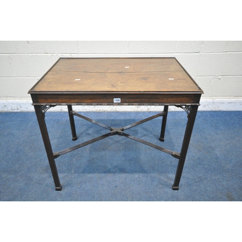 1300 - A 20TH CENTURY MAHOGANY RECTANGULAR CENTRE TABLE, with open fretwork detail, united by a cross shape... 