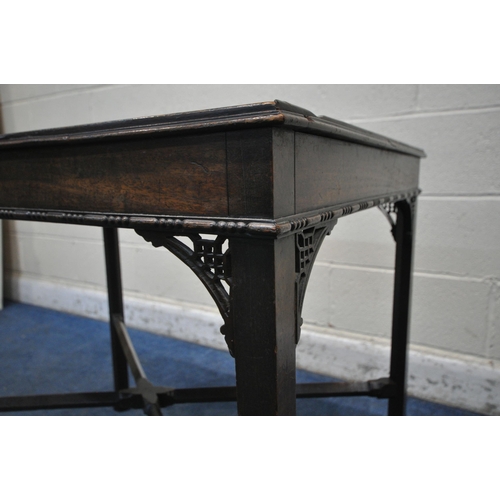 1300 - A 20TH CENTURY MAHOGANY RECTANGULAR CENTRE TABLE, with open fretwork detail, united by a cross shape... 