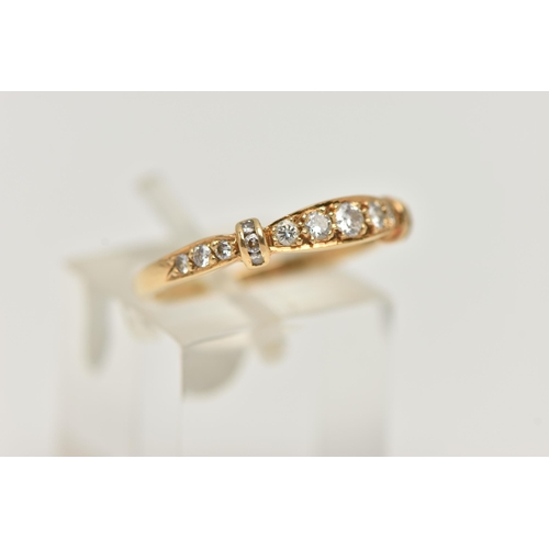 15 - AN 18CT GOLD, DIAMOND HALF ETERNITY RING, set with seventeen round brilliant cut diamonds, estimated... 