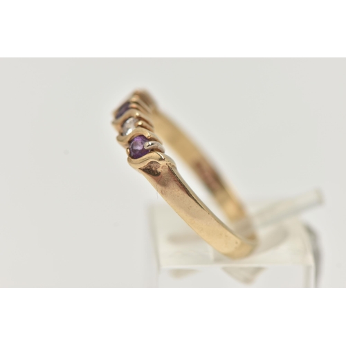 25 - A 9CT GOLD AMETHYST AND DIAMOND RING, the five stone ring set with two brilliant cut diamonds and th... 