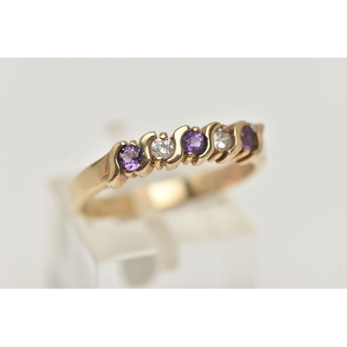 25 - A 9CT GOLD AMETHYST AND DIAMOND RING, the five stone ring set with two brilliant cut diamonds and th... 