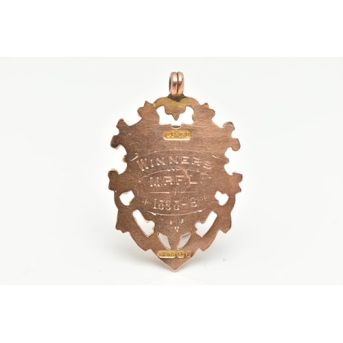 3 - A LATE VICTORIAN 9CT GOLD FOB MEDAL, shield shape with engraved monogram, engraved to the reverse 'W... 