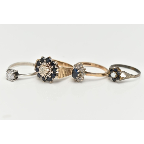 35 - FOUR GEM SET RINGS, the first a 9ct gold sapphire and diamond cluster ring, hallmarked 9ct London, r... 