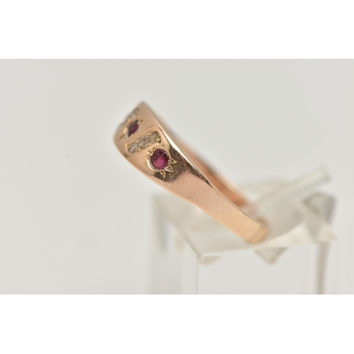 38 - A RUBY AND DIAMOND RING, designed as three circular cut rubies interspaced by three rose cut diamond... 