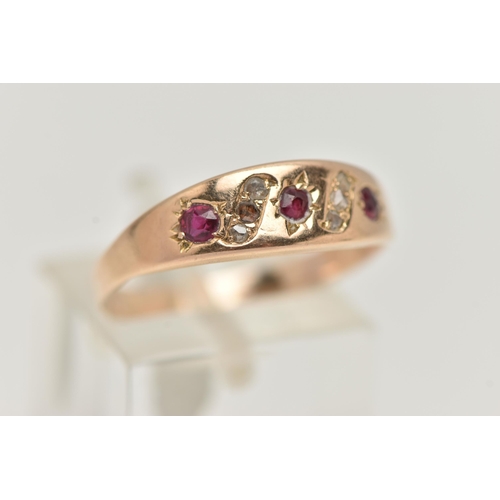 38 - A RUBY AND DIAMOND RING, designed as three circular cut rubies interspaced by three rose cut diamond... 