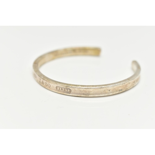 49 - A TIFFANY & CO. BANGLE, the torque bangle stamped 925 T & Co 1837, inner bangle stamped Tiffany & Co... 