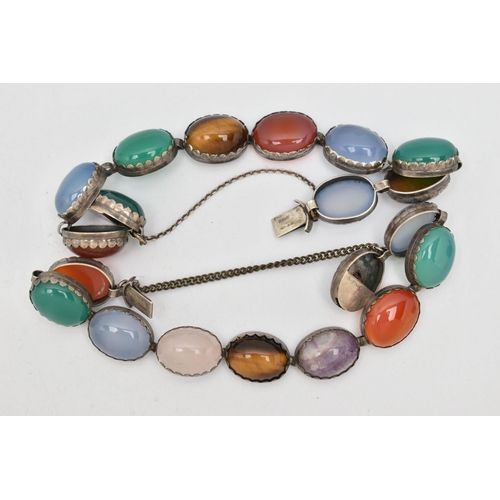 53 - TWO MULTI-GEM CABOCHON BRACELETS, gems include tiger's eye and chalcedony, to the push piece clasps,... 