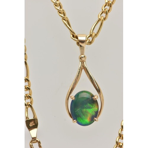 6 - A 9CT GOLD FIGARO CHAIN WITH AN AMMOLITE PENDANT, chain fitted with a lobster clasp, hallmarked 9ct ... 