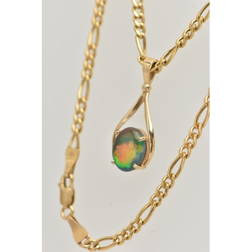 6 - A 9CT GOLD FIGARO CHAIN WITH AN AMMOLITE PENDANT, chain fitted with a lobster clasp, hallmarked 9ct ... 