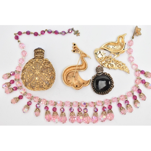 81 - A SMALL ASSORTMENT OF COSTUME JEWELLERY, to include a pink beaded necklace, two bird brooches, toget... 