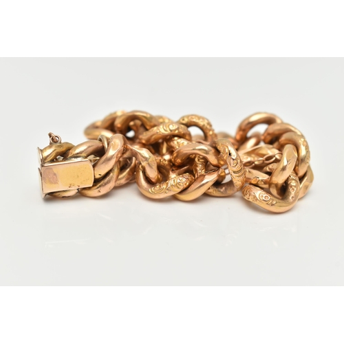 9 - A YELLOW METAL CURB LINK BRACELET, hollow links alternating between floral patterned and plain polis... 