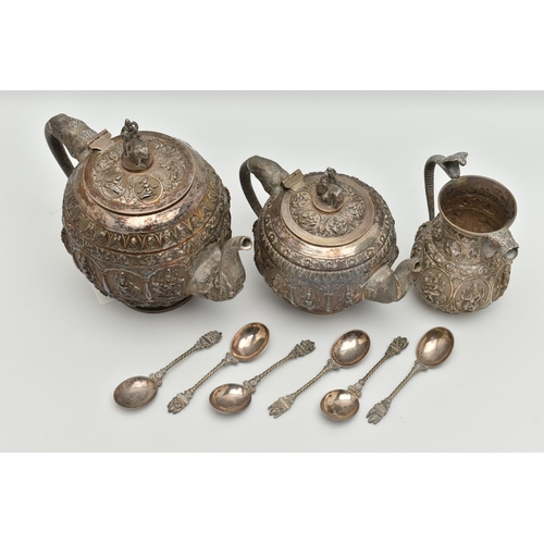 101 - A LATE 19TH CENTURY INDIAN TEA SET, to include a tea pot, water pot, milk jug and six spoons, all wi... 