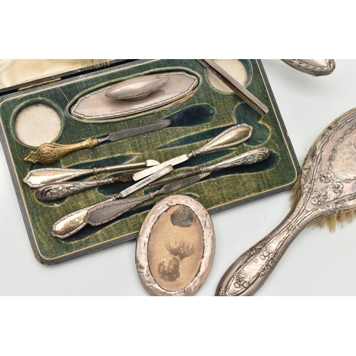 102 - ASSORTED SILVER ITEMS, to include a hand held mirror, hallmarked Birmingham, two hair brushes each h... 