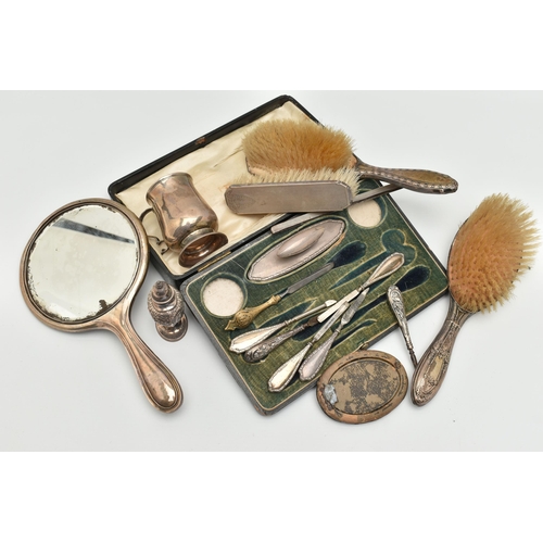 102 - ASSORTED SILVER ITEMS, to include a hand held mirror, hallmarked Birmingham, two hair brushes each h... 