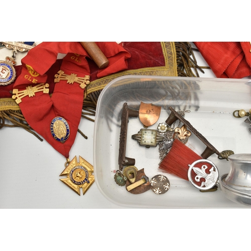 112 - A BOX OF ASSORTED MASONIC ITEMS, to include an apron, a sash and a pair of gauntlets, also including... 