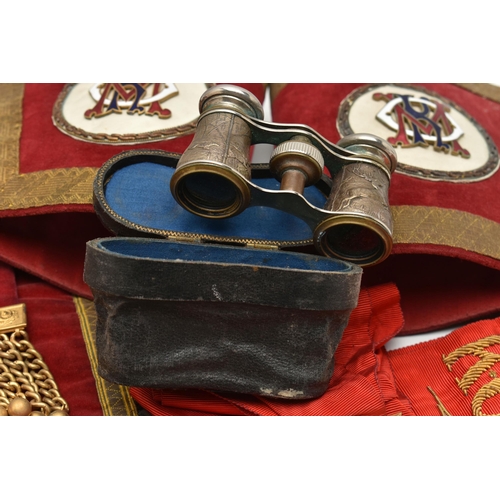 112 - A BOX OF ASSORTED MASONIC ITEMS, to include an apron, a sash and a pair of gauntlets, also including... 