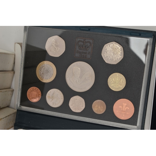 127 - A LARGE BOX CONTAINING ROYAL MINT PROOF YEAR SETS, to include proof sets from 1983 - 2003, with 1997... 