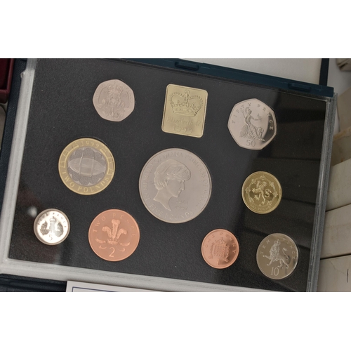 127 - A LARGE BOX CONTAINING ROYAL MINT PROOF YEAR SETS, to include proof sets from 1983 - 2003, with 1997... 