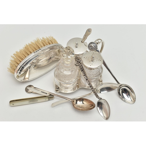 99 - A SMALL ASSORTMENT OF SILVER ITEMS, to include a three piece cruet set with stand, comprising of a g... 