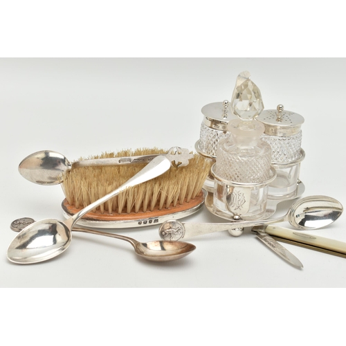 99 - A SMALL ASSORTMENT OF SILVER ITEMS, to include a three piece cruet set with stand, comprising of a g... 