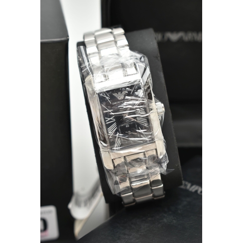 140 - AN EMPORIO ARMANI GENTLEMAN'S WRISTWATCH, the rectangular black face with Roman numerals and subsidi... 