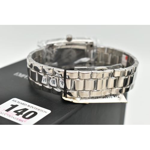 140 - AN EMPORIO ARMANI GENTLEMAN'S WRISTWATCH, the rectangular black face with Roman numerals and subsidi... 